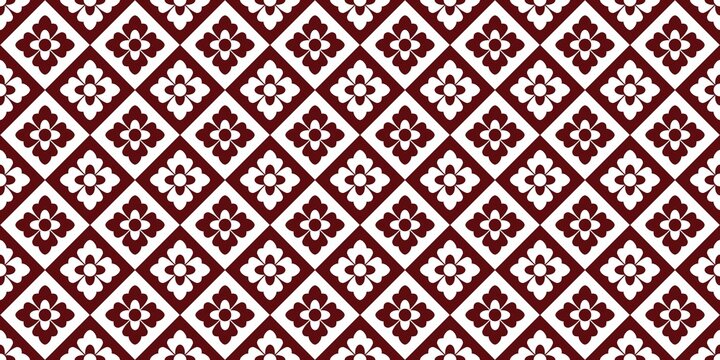 ​Traditional Indonesian batik seamless pattern background with geometric floral motif in maroon red and white for textile design.