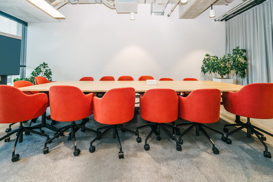 Empty conference room red chairs business recruitment meeting