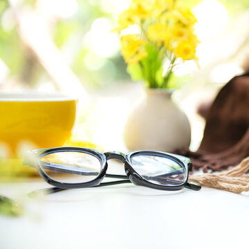 Dream plan notebook workspace inspiring personal growth and life goals with yellow cup coffee.  Warm sunshine.  Goal Life Wellness Concept.