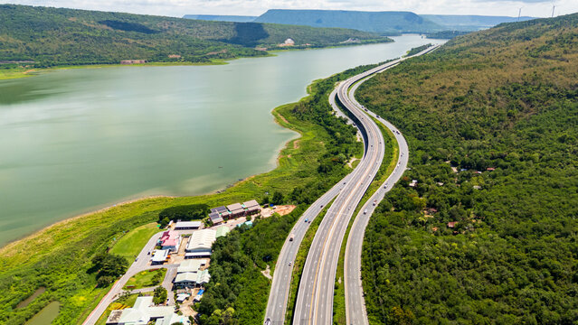 Drone shot The M6 motorway Nakhon Ratchasima Province - Bang Pa-in Lam Ta Khong River and Mountain. Motorway Korat Thailand