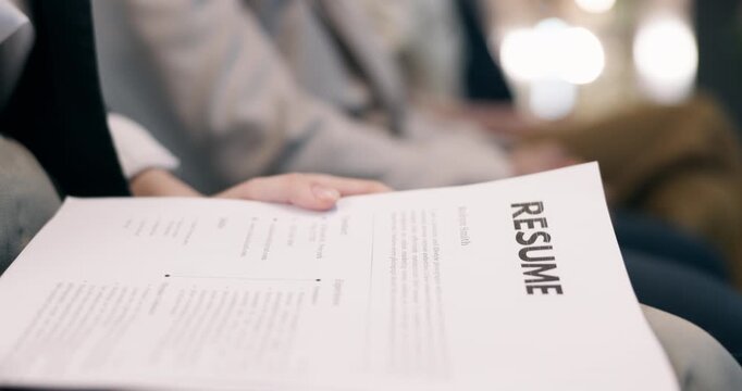 Document, hands and waiting room with resume for interview, job opportunity or hiring in office. Business people, paper or candidates with CV for career portfolio or recruiting process in workplace