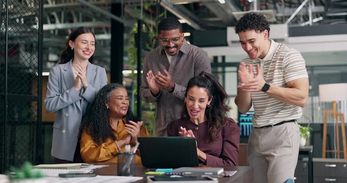 Excited, team and applause at laptop in office for viral campaign, ROAS target and brand deal. Tech, happy people and celebration with clapping at marketing agency for pitch win, ad growth or success