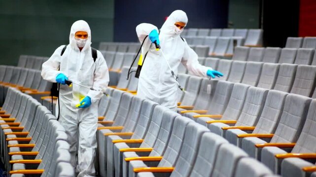 Professional Disinfection Team Sanitizing Public Areas, Hygiene and Safety Concept	