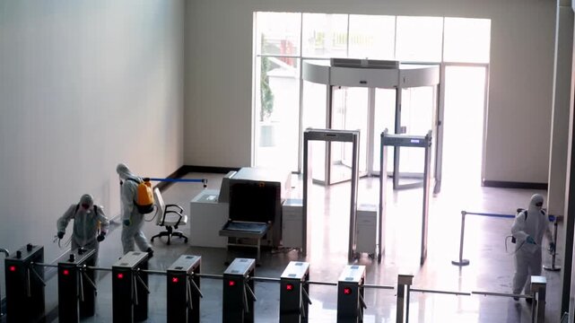 Professional Disinfection Team Sanitizing Public Areas, Hygiene and Safety Concept	