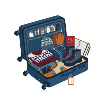 Open blue suitcase packed for winter travel with boots sweater beanie gloves passport and camera illustration