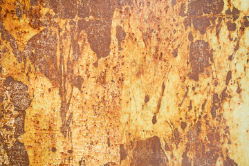 Fototapeta premium Full frame background of aged metallic surface featuring distressed paint layers, rust drip patterns, and industrial grunge texture.