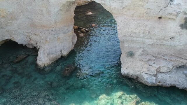 Aerial Drone View of Torre Sant'Andrea Sea Stacks and Natural Arches, Sea, Ocean, Beach, Puglia, Italy