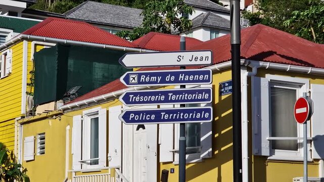 Street Signs in Gustavia, Saint Barthelemy Island in Front ot Yellow House in Residential Neighborhood