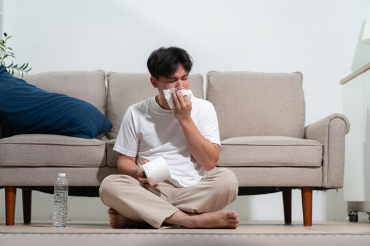 Man feeling sick with headache, healthcare, migraine, Illness & medical concept.