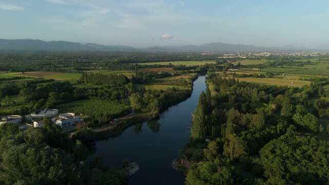 Panoramic drone shot of a river in Frejus, golden hour in France countryside