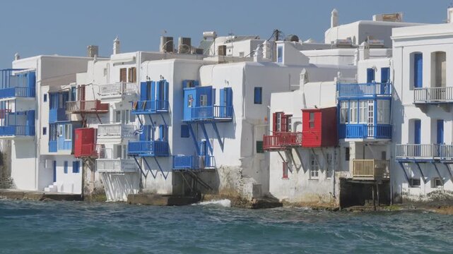Colorful waterfront houses and balconies of Little Venice Alefkandra rising above the sea in Mykonos