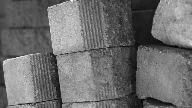 Various landscaping bricks stacked for storage after a build.
