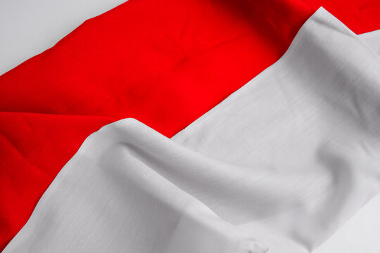 Close Up Of Indonesia Flag Against On White background