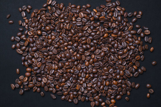 Full frame texture of aromatic roasted coffee beans background