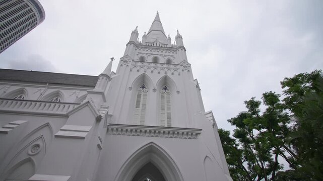 Historic Anglican Saint Andrews Cathedral standing proudly in Singapore city with elegant colonial architecture and memorable tourism landmark in Asia