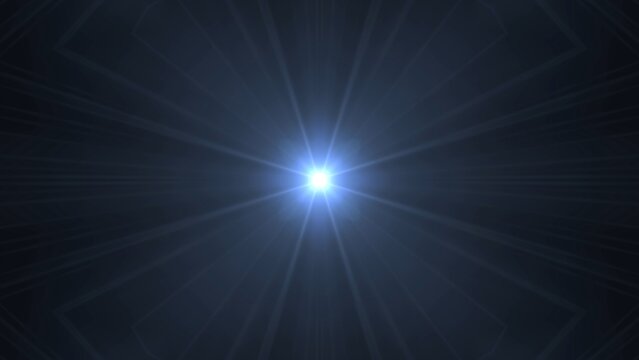 Bright blue light radiates from center against dark backdrop. Sharp rays stretch outward