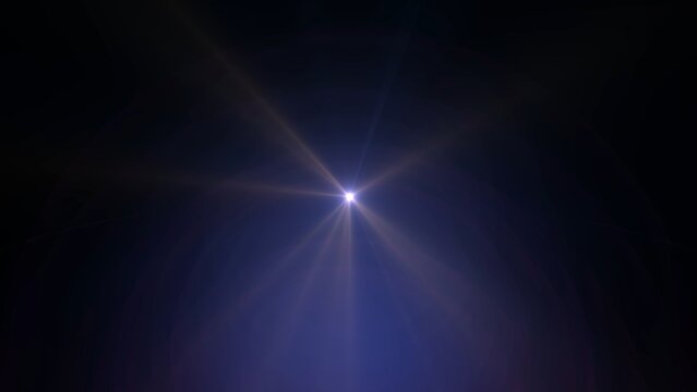 Single bright blue light radiates from center. Deep darkness surrounds the radiant burst
