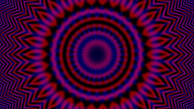 Vibrant, hypnotic pattern radiates from center outward. Deep purples and reds swirl in concentric
