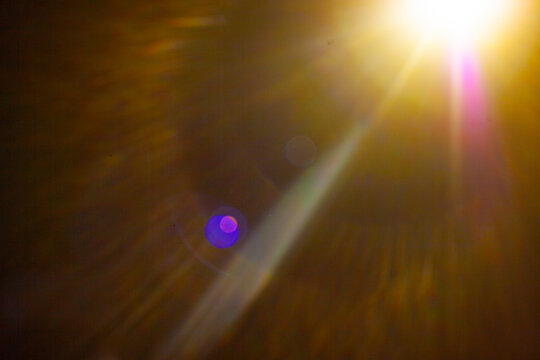 Sun flare on the black background