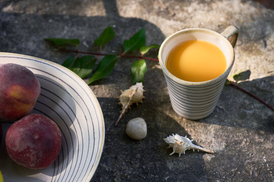 Striped Ceramic Cup with Pitcher and Fruit Bowl in Soft Garden Light