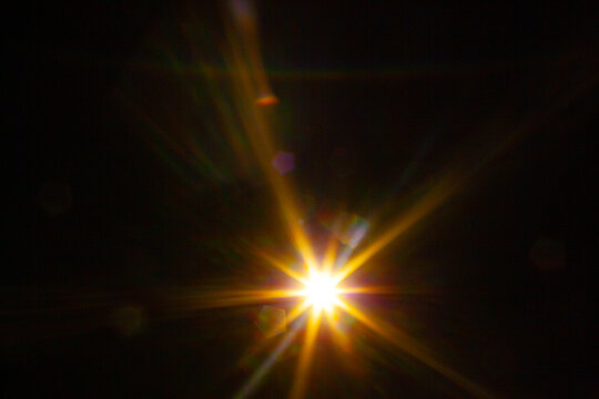Sun flare on the black background
