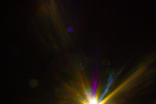 Sun flare on the black background