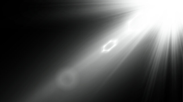 Bright white corner lens flare with dramatic sunburst rays and ring bokeh on black background