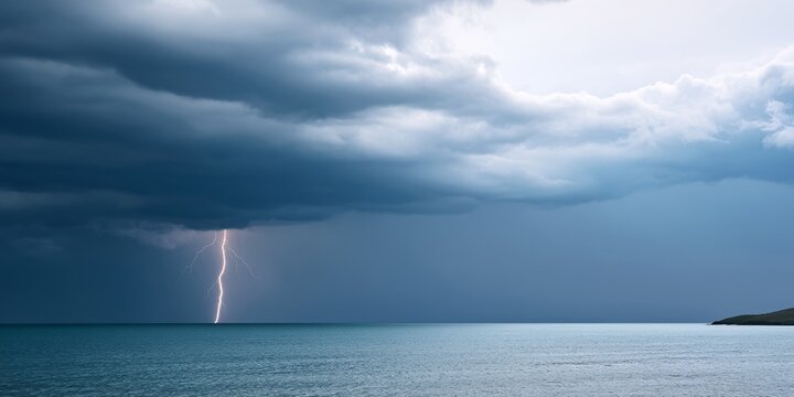 Dramatic storm clouds rolling in over a tranquil deserted beach with gentle ocean waves crashing on the shore