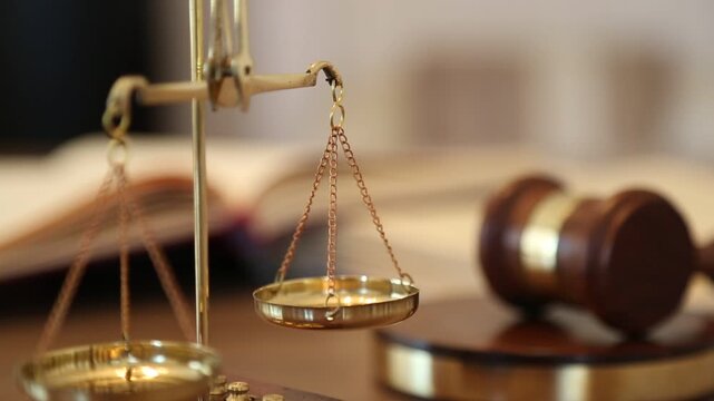 Judge's Gavel with Blurred Law Books