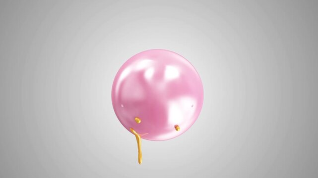 Glossy pink sphere rotates as gold and blue liquid paint drips over its surface on a bright green chroma key background in clean minimal 3D animation