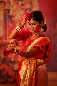 Portrait of Bengali married women celebrating Durga Puja