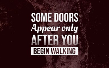 Motivational typography suggesting that new doors appear only after taking the first step, displayed over a dark red forest and mountain background. © DaffinArt