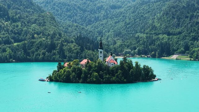 Drone Shot of Island on Lake Bled, Slovenia. Catholic Church and Turquoise Alpine Water on Sunny Summer Day