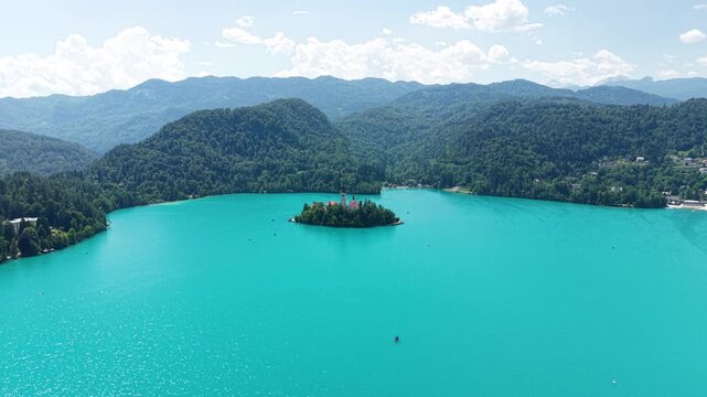Lake Bled, Slovenia. Drone Shot of Turquoise Aline Water and Island Under Hills of Julian Alps
