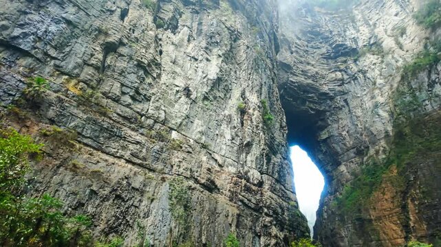 Three Natural Bridges in Chongqing, China. UNESCO World Heritage Site With Steep Limestone Arch Structures. Low Angle Shot