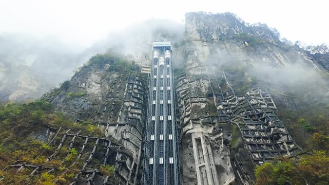 The Massive Sightseeing Elevator At The Three Natural Bridges, UNESCO World Heritage Site In Wulong, Chongqing, China. Tilt-up Shot
