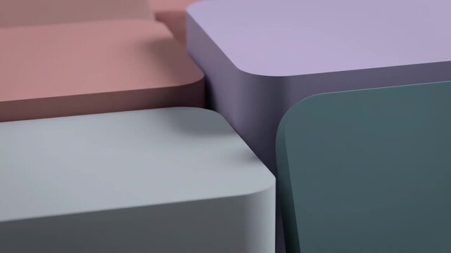 Abstract background featuring geometric arrangement of four colorful pastel blocks with soft, rounded corners and matte texture.