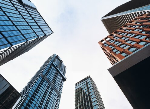 Architecture details Modern Glass facade building Office Business background Low angle view 
