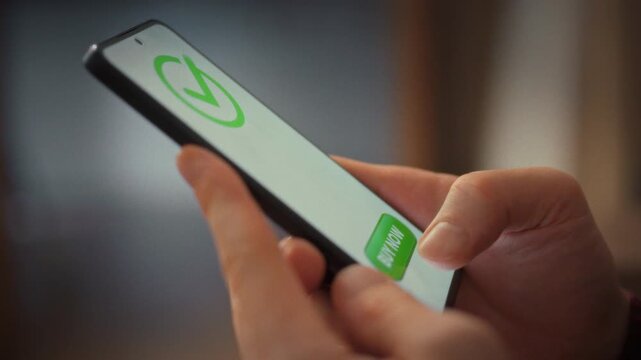 Smartphone screen shows man confirming an online purchase with single tap. The payment processes instantly, flashing successful notification, highlighting how modern tech makes shopping fast and easy