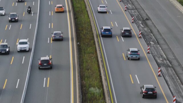 Aerial view of the eHighway test track with cars driving on the asphalt road in Weiterstadt, Hessen, Germany.