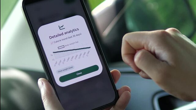Smartphone dashboard visualizes long-term weight and calorie patterns, highlighting digital health tools, self-monitoring and smarter lifestyle decisions.