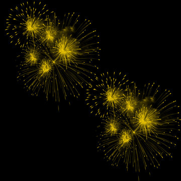Two Clusters of Yellow Fireworks Upper Left Lower Right on Black