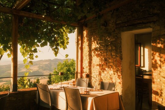 Al fresco dining terrace overlooking the Tuscan hills