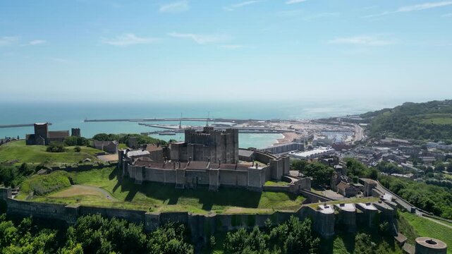 Aerial view of Dover Castle overlooking the harbor and coastline in Dover, England, United Kingdom.
