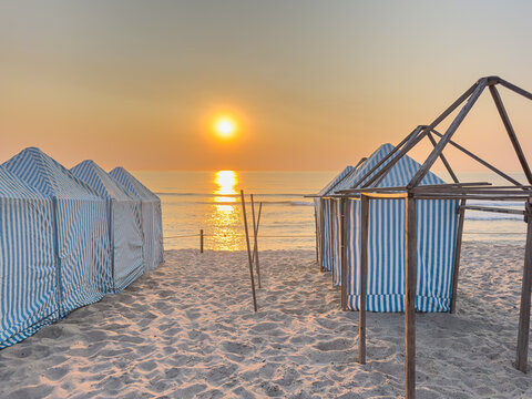 Beach Tents and Huts at Sunset