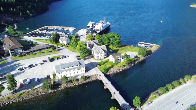 Drone Flying Toward Bridge and Ferry Terminal in Hellesylt, Norway
