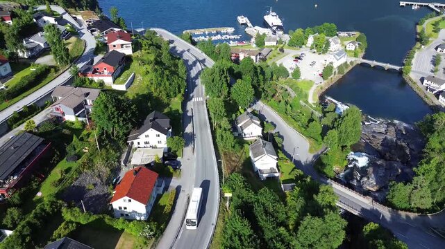 Drone Following Bus Through Hellesylt Village in Western Norway