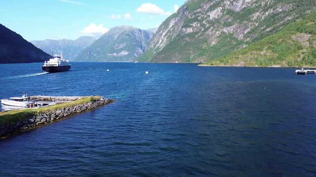 Ferry Departing Hellesylt Toward Geirangerfjord in Western Norway