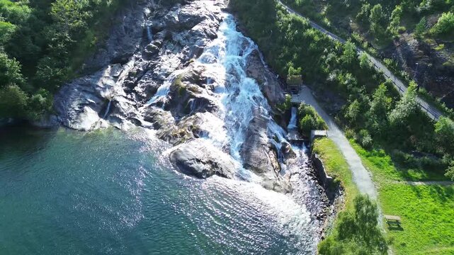 Wide Drone Zoom Out From Hellesyltfossen to Hellesylt Harbor, Norway