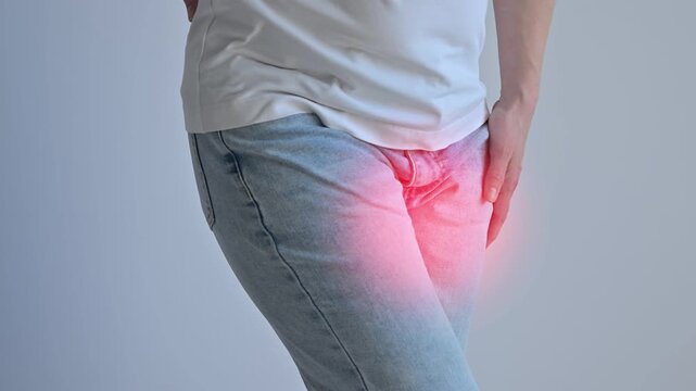 A woman suffers from pain Cystitis. Red circle. 